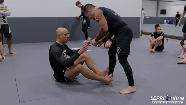 Sitting Foot Sweep by Pulling Opponent In
