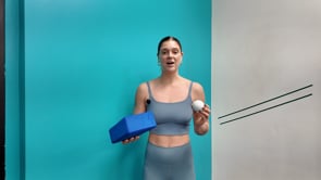 Pec Minor smash with ball and yoga block on wall