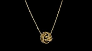 Italian 14kt Yellow Gold Textured Love Knot Pendant Necklace