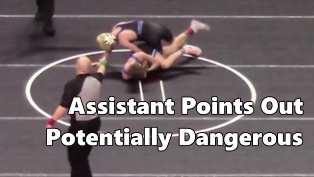 Assistant Official Points Out Potentially Dangerous Situation