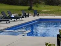 The Intrigue In-Ground Fiberglass Pool - Aviva Pools