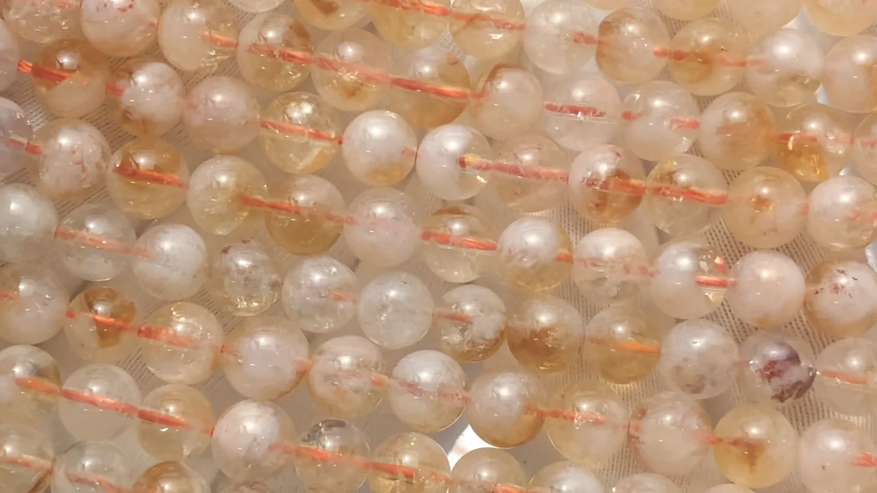 バイカラーシトリン ラウンド7mm 1連（約37cm）｜天然石ビーズの卸問屋