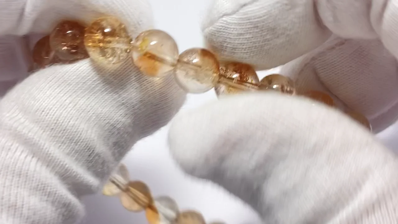 動画】【1点もの】宝石質シャンパントパーズAAA- ラウンド7～7.5mm 1連