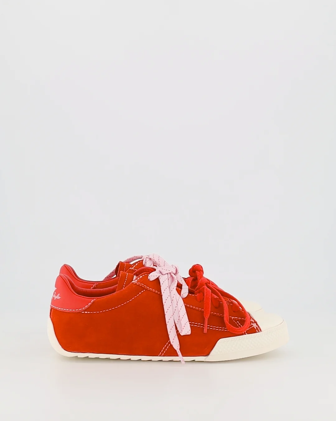 Shop Converse Chuck Taylor Lo Pro in Red.