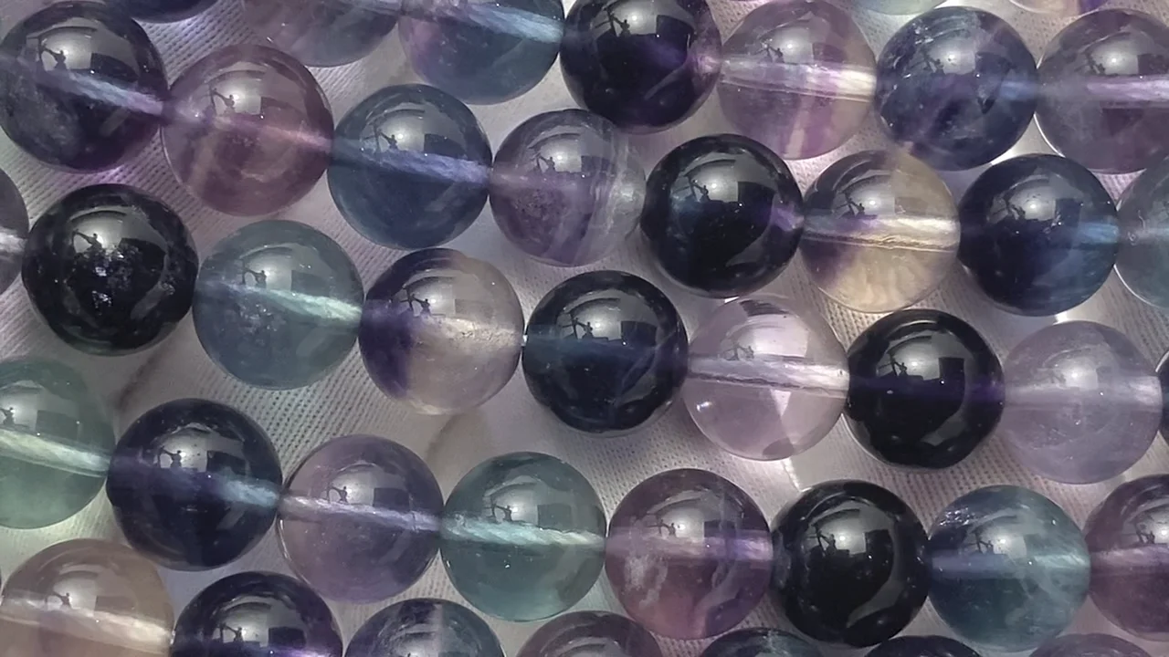 マルチカラーフローライト ラウンド10mm 半連/1連｜天然石ビーズの卸