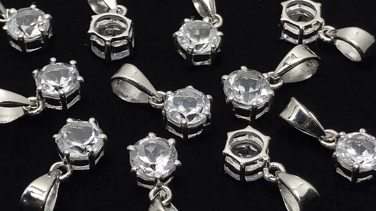 宝石質ホワイトトパーズ AAA ラウンドファセットカット7×6mm