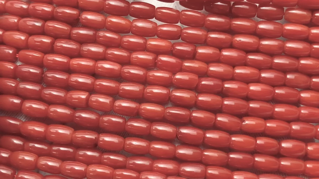 赤珊瑚・レッドコーラル（染） チューブ～ライス5×3×3mm 1連｜天然石