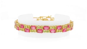 17.00 ct. t.w. Pink Topaz and 6.00 ct. t.w. Peridot Bracelet in 18kt Gold Over Sterling