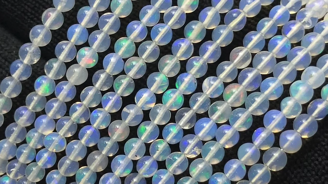 動画】宝石質エチオピア産オパールAAA セミラウンド3~4mm 1連