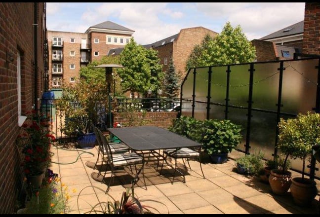 Double bedroom with shower/bath and sunny patio Main Photo