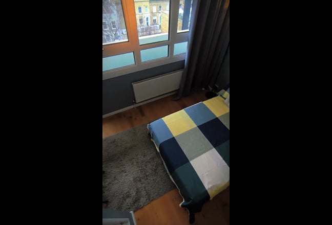 Bright Top-Floor Double Room with Stunning Skyline Main Photo