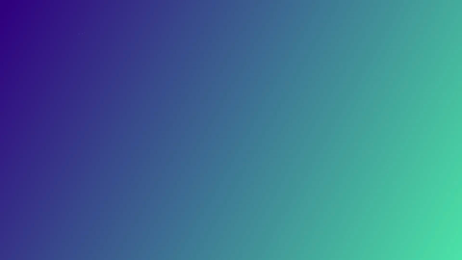 A woman uses a computer in a cosy looking home office.