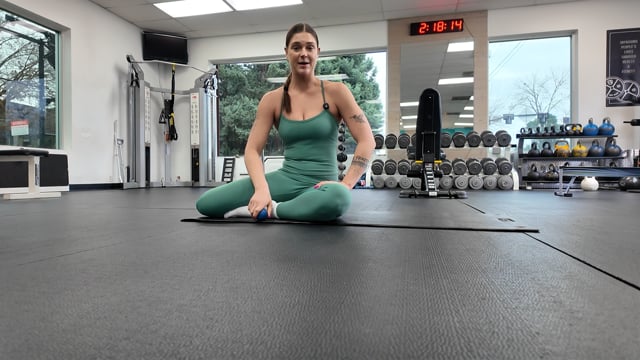 Posterior scapula smash with squishy ball on floor with shoulder rotation