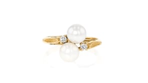 C. 1990 Vintage 6mm Cultured Pearl Bypass Ring with .10 ct. t.w. Diamonds in 14kt Yellow Gold