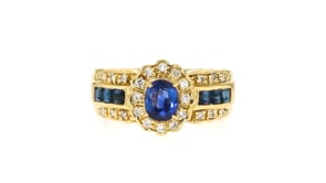 C. 1980 Vintage .94 ct. t.w. Sapphire and .15 ct. t.w. Diamond Ring in 18kt Yellow Gold