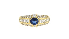 C. 1980 Vintage .55 Carat Sapphire and 1.40 ct. t.w. Diamond Ring in 18kt Yellow Gold