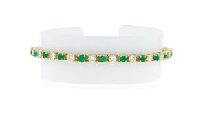 C. 1990 Vintage 2.00 ct. t.w. Diamond and 1.25 ct. t.w. Emerald Tennis Bracelet in 14kt Yellow Gold
