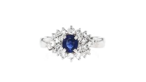 C. 2000 Vintage .65 Carat Sapphire Ring with .58 ct. t.w. Diamonds in Platinum