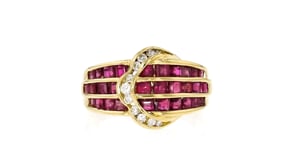 C. 1980 Vintage .96 ct. t.w. Ruby and .15 ct. t.w. Diamond Buckle Ring in 18kt Yellow Gold