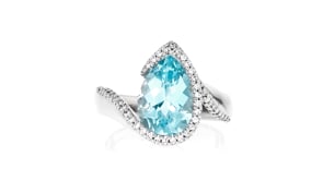 C. 2000 Vintage 4.00 Carat Swiss Blue Topaz Swirl Ring with .35 ct. t.w. Diamonds in 18kt White Gold