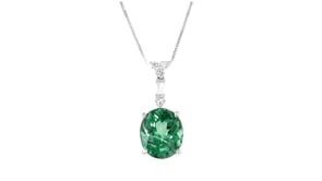 C. 1990 Vintage 5.34 Carat Oval Green Tourmaline Pendant Necklace with .21 ct. t.w. Diamonds in Platinum