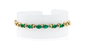 C. 1980 Vintage 2.10 ct. t.w. Emerald and .25 ct. t.w. Diamond Bracelet in 14kt Yellow Gold