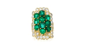 C. 1980 Vintage 4.10 ct. t.w. Emerald and 1.75 ct. t.w. Diamond Cluster Ring in 18kt Yellow Gold