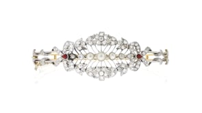 C. 1910 Vintage Cultured Pearl and 1.75 ct. t.w. Diamond Openwork Bangle Bracelet with .20 ct. t.w. Garnets in Platinum and 18kt
