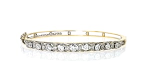 C. 1900 Vintage 1.50 ct. t.w. Diamond Bangle Bracelet in Platinum and 10kt Yellow Gold