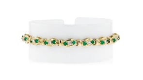 C. 1980 Vintage 1.80 ct. t.w. Emerald and .95 ct. t.w. Diamond Link Bracelet in 14kt Yellow Gold