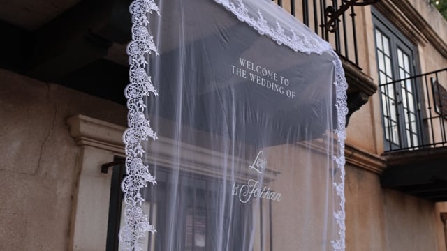 Still frame from Jon and Lexie's extended cut Sedona wedding film at Tlaquepaque Arts and Shopping Village in Sedona, AZ