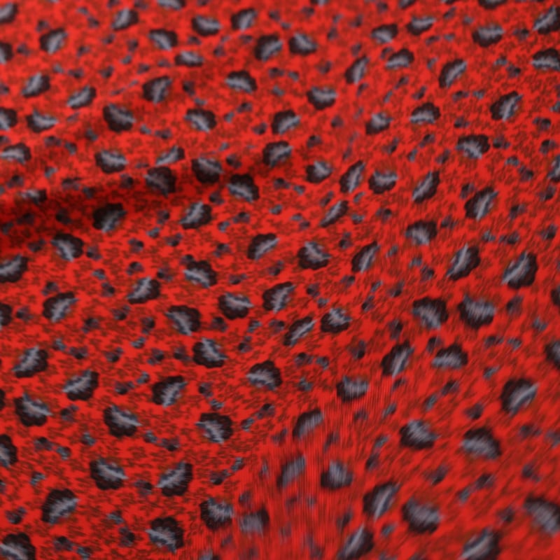 Vidéo: Crépon – Fleurs stylisées fond rouge