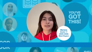 Grade 11 student with long brown hair, wearing a red hoodie, standing upright and facing the camera. Photo centred on a blue graphic background.