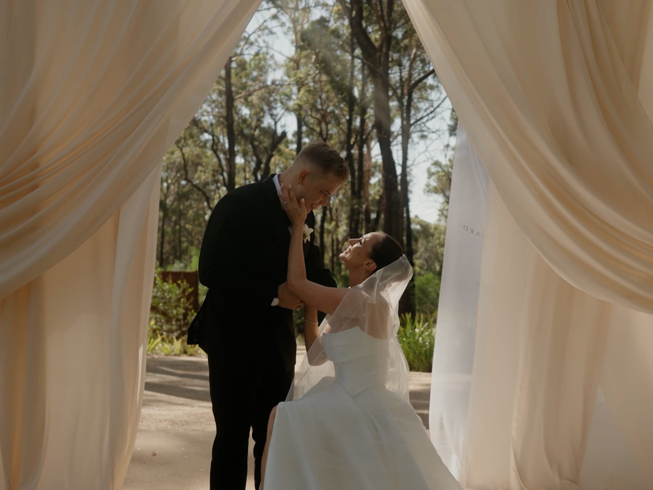 Still from Nat and Ed's South Coast wedding film