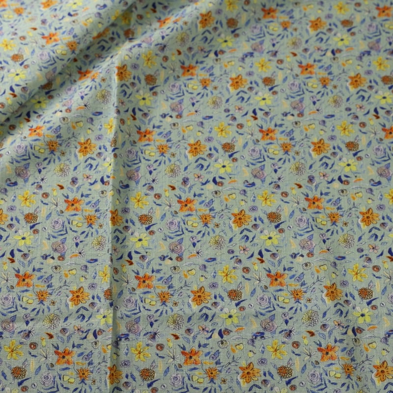 Vidéo: Étoffe de lin & viscose - Fleurs multicolores fond vert d’eau