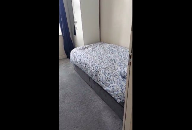 Single bedroom with wardrobe and side table Main Photo