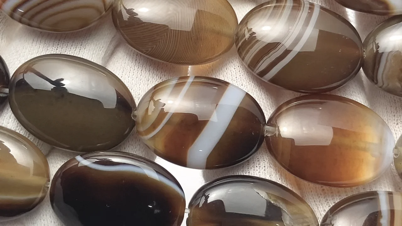 ブラウンストライプアゲート オーバル25×18mm 1連｜天然石ビーズの卸