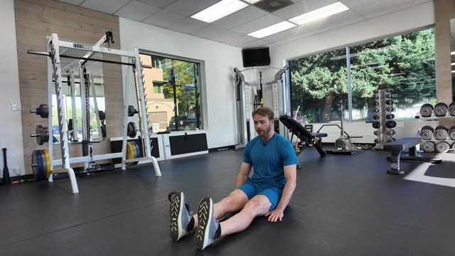 Seated Leg Lift over Kettlebell