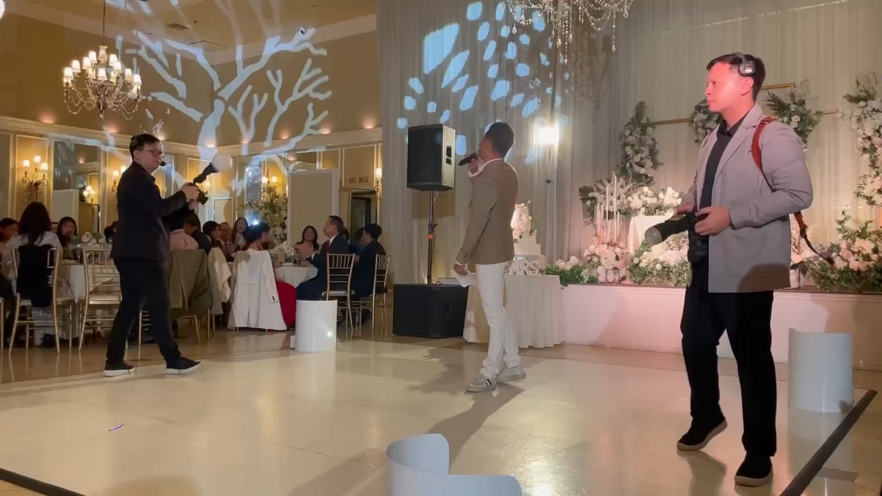 Quang hosting a Vietnamese wedding