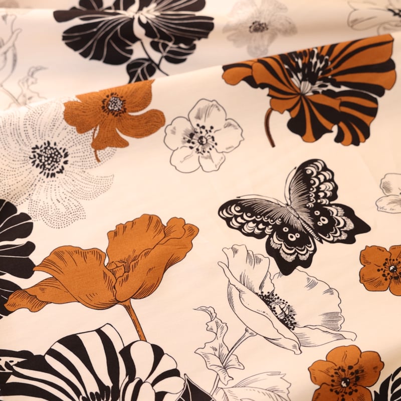 Vidéo: Popeline 100% coton – Fleurs géométriques terracotta