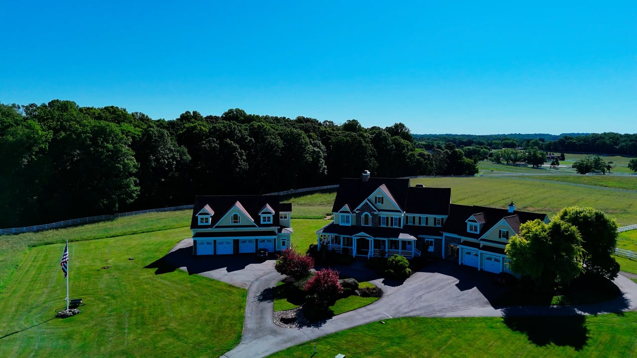 Aerial drone walkthrough of a completed Supreme Restorations Maryland residential roof replacement