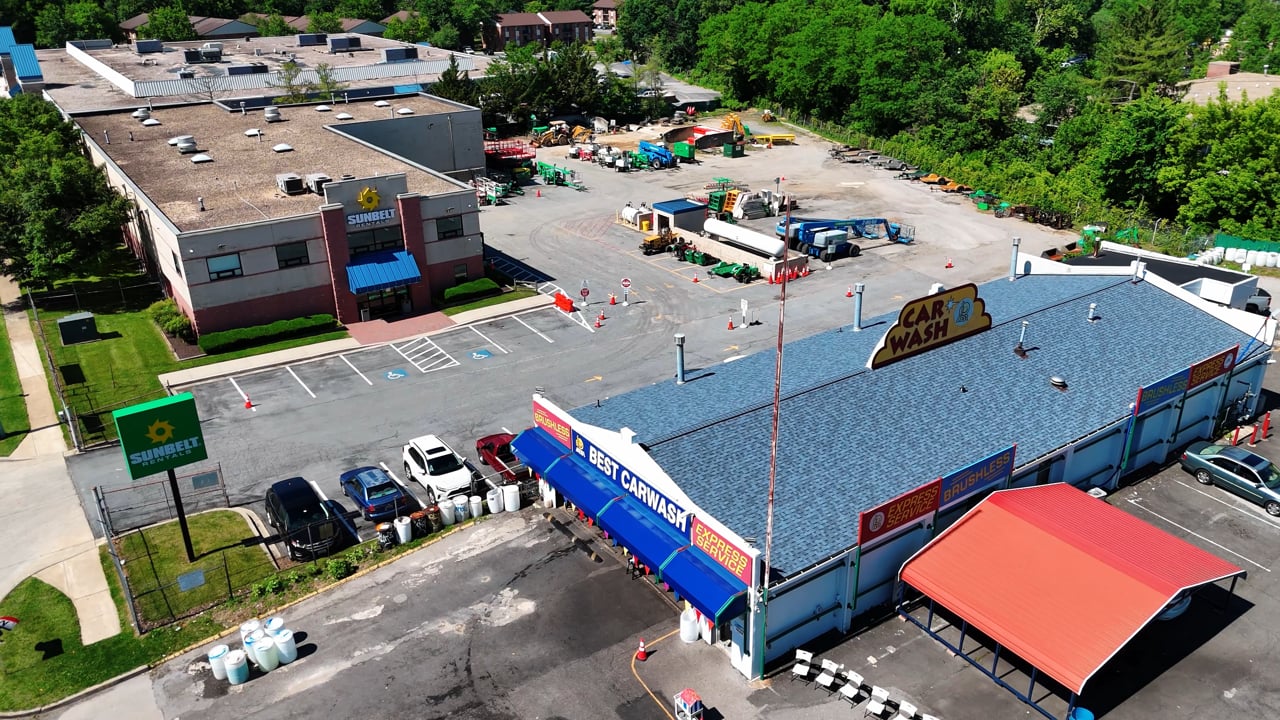 Aerial drone flyover of a completed Supreme Restorations commercial car wash roof replacement in Maryland