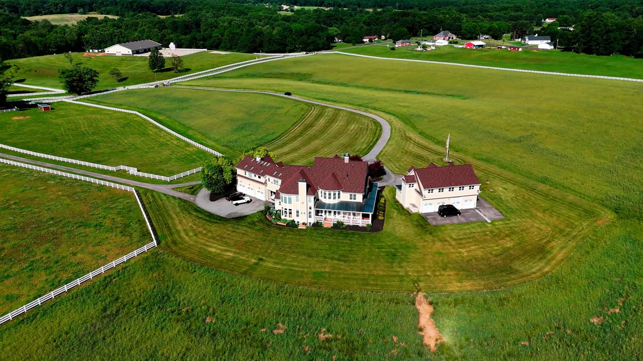 Aerial drone compilation reel of completed Supreme Restorations residential and commercial roof replacement projects