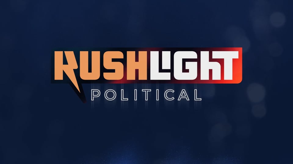 Video production crew filming a political campaign commercial with a candidate speaking on camera during an election season advertisement shoot.