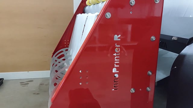InnoSlitter and InnoPrinter MK3 press printing DTF transfers on makeup bags