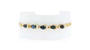 C. 1990 Vintage 2.25 ct. t.w. Sapphire and .30 ct. t.w. Diamond Bracelet in 14kt Yellow Gold