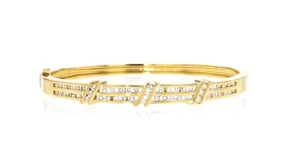 C. 1990 Vintage 1.00 ct. t.w. Diamond Bangle Bracelet in 14kt Yellow Gold