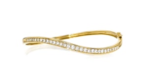 C. 2000 Vintage 1.25 ct. t.w. Diamond Wave Bangle Bracelet in 14kt Yellow Gold