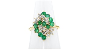 C. 1980 Vintage 1.10 ct. t.w. Emerald and .65 ct. t.w. Diamond Swirl Ring in 18kt Yellow Gold
