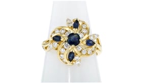C. 1980 Vintage .62 ct. t.w. Sapphire and .60 ct. t.w. Diamond Swirl Ring in 14kt Yellow Gold